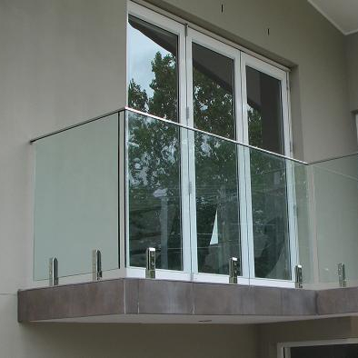 Stainless steel balcony spigot railing with 12mm clear laminated glass panel