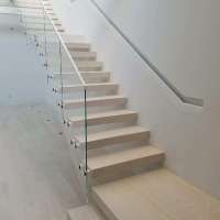 Pre-buried stringer floating stairs with safe glass railing